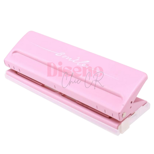 Perforadora ajustable para portafolios tipo binder A5